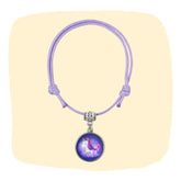 Purple faux leather unicorn charm bracelet with adjustable cord and silver-tone unicorn pendant. Ideal unicorn jewelry for girls aged 3 to 7.
