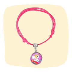 Unicorn Charm Bracelet - Faux Leather Jewelry | Adjustable, Trendy pink bracelet with unicorn charm on beige background. Ideal for girls aged 3 to 7.