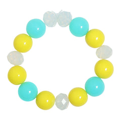Girls' bracelet with yellow, green, and translucent milky beads. Trendy and colorful accessory for parties or daily outfits.