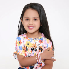 Young girl wearing Bubblegum Bliss Clay Beaded Bracelet Set, showcasing stackable aesthetic bracelets perfect for ages 3 to 7 and Gen Z style.