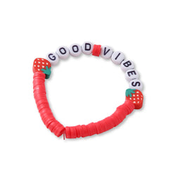 Close-up of 'Good Vibes' bracelet from the Berry Bliss Clay Bead Bracelet Stack, with red clay beads and strawberry-shaped accents.