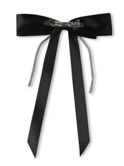 Back view of black satin hair bow showing secure metal clip. Durable and stylish for everyday or special occasions.