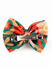 Back view of Arendelle Christmas Hair Bow with secure alligator clip, ideal for girls' holiday hairstyles and gifting.