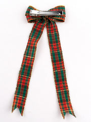 Close-up of Arendelle's plaid Christmas hair bow with durable alligator clip, designed for festive styling and secure hold.