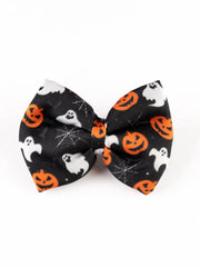 Close-up of black Halloween Collection Hair Bow featuring spooky ghost and pumpkin print. Lightweight and festive for Halloween styling.