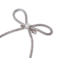 Detail view of handmade Rhinestone Hair Bow with pearl center. Sparkling accessory perfect for formal or casual hairstyles.