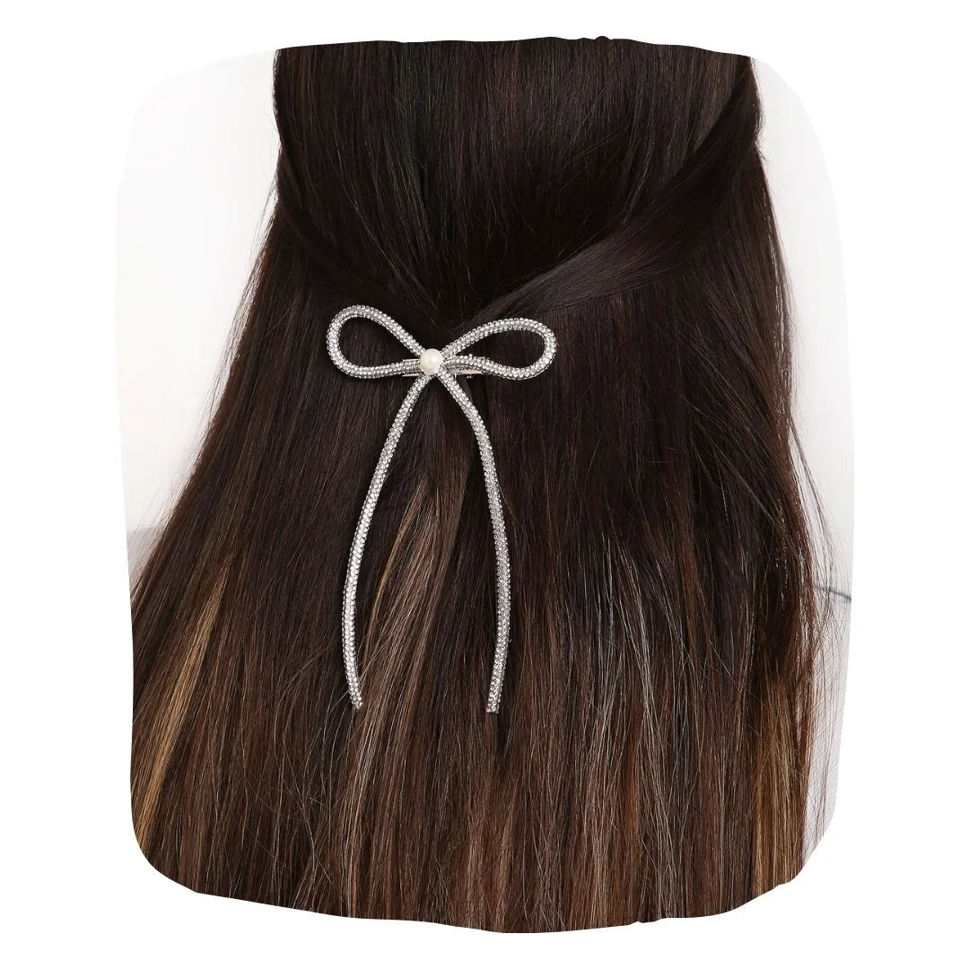 Rhinestone Hair Bow - Pearl Embellished adds sparkle to long dark hair. Handmade with secure clip, ideal for elegant hairstyles.