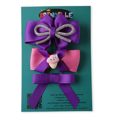 Pink Purple Hair Bows Combo on branded card packaging, includes glitter bow, ice cream charm bow, and classic ribbon bow.