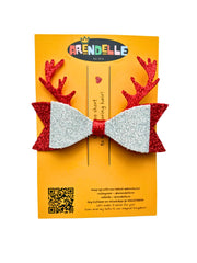 Festive Glitter Hair Bow on branded Arendelle card with red antlers and silver bow, part of the Christmas Hair Bow Collection for girls.