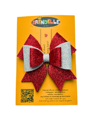 Glitter hair bow for girls on branded Arendelle packaging, part of the Christmas Collection. Great gift idea for festive hair styling.