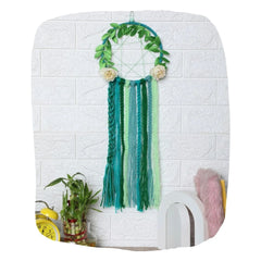 Green Dreamcatcher Hair Accessories Holder by Arendelle Kids with braided yarn strands and floral accents, perfect for organizing bows and clips.