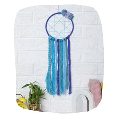 Arendelle Blue Dreamcatcher bow organizer with braided yarn strands and pom-pom accents, perfect gift for girls' room decor and hair accessory storage.