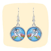 Unicorn Earrings - Glass Cabochon with whimsical unicorn and girl design on blue background. Magical jewelry gift for girls and teens.