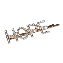 Angled view of Gold Glitter HOPE Hairpin with rhinestone-studded letters on gold-tone metal, ideal for fashionable hair styling.
