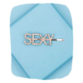 Gold Glitter Hairpin with 'SEXY' lettering on a blue background. Stylish metal clip for girls, ideal for festive and party hairstyles.