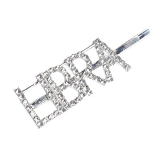 Close-up of Libra rhinestone zodiac hairpin with glittering crystal 'LIBRA' letters on a silver clip, ideal for zodiac-themed hair styling.