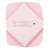 Scorpio Zodiac Hairpin with sparkling rhinestones on a pink geometric background, perfect astrology accessory for stylish hair looks.