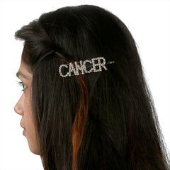 Cancer zodiac rhinestone hairpin styled on dark hair. Sparkling clip adds a celestial touch to any hairstyle.
