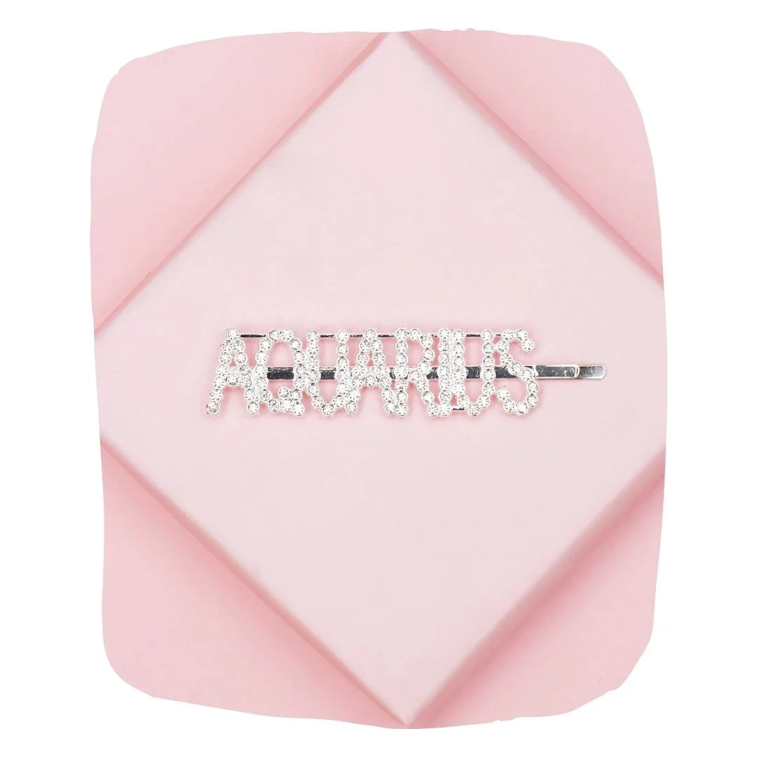 Aquarius Hairpin - Zodiac Rhinestones by Arendelle displayed on a pink geometric background, perfect for astrology-themed hair styling.