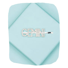 Gemini zodiac hairpin with rhinestone lettering on a pastel blue background, perfect astrology clip for stylish hair accessorizing.