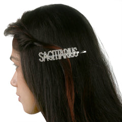 Sagittarius rhinestone hairpin worn by a girl, showcasing stylish zodiac clip with shimmering detail and secure hold for teens and women.