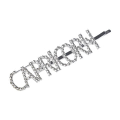 Capricorn Zodiac Hairpin - Rhinestone Clip close-up on white background, featuring clear rhinestones in bold lettering for a stylish zodiac look.