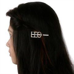 Girl wearing LEO Zodiac Hairpin with sparkling rhinestones, showcasing stylish astrology hair accessory for teens and women.