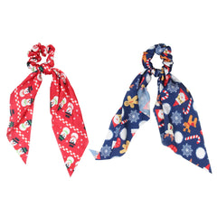 Set of two Christmas scrunchies for girls by Arendelle featuring Santa, snowman, gingerbread, and candy cane prints. Perfect for festive styling.