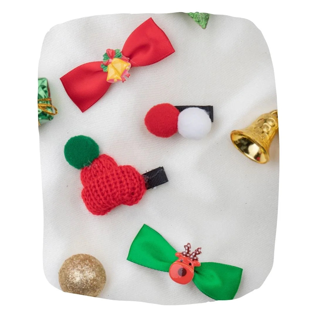 Festive Christmas hair clips for girls 2023 featuring red bows, pom poms, and holiday-themed designs. Ideal for parties and seasonal outfits.