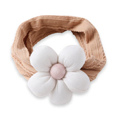 Stretchable baby cotton headband in tan featuring a soft white flower, ideal for stylish infant wear in the hair accessories category.