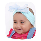 Sky Blue Cotton Baby Headband with double-layered bow on smiling baby girl. Soft, stretchable design ideal for newborns and toddlers.