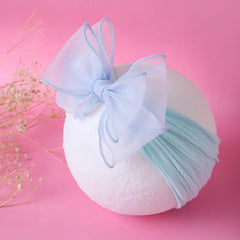 Sky Blue Cotton Baby Headband displayed on white ball with delicate double-layered bow. Perfect hair accessory for infants and toddlers.