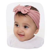 Rose Pink Headband - Cotton Baby Headbands | Soft, Stretchable headband with big bow worn by smiling baby girl, ideal for 0 to 2 years.