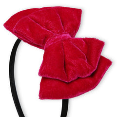 Close-up of Velvet Bow Hairband - Pink Double Layered featuring soft velvet fabric and a bold bow on a black band for girls' fashion.