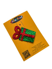 Christmas Glitter Hair Clip on branded Arendelle gift card, ready for gifting; festive red and green design for holiday celebrations.