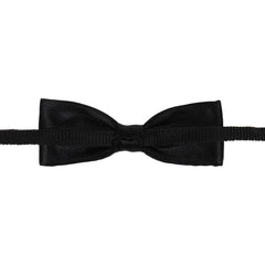 Rear view of black satin bow tie for boys showing clip-on strap and stitching. Designed for easy wear and comfort.