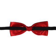 Rear view of red satin bow tie for boys showing black adjustable clip-on strap, designed for comfort and easy wear.