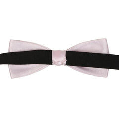Back view of baby pink satin bow tie showing black adjustable strap. Clip-on style ensures secure fit for toddlers and young boys.