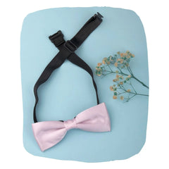 Adjustable satin bow tie for boys in baby pink with black clip-on strap, ideal for ages 1-5. Pre-tied design perfect for formal events or parties.