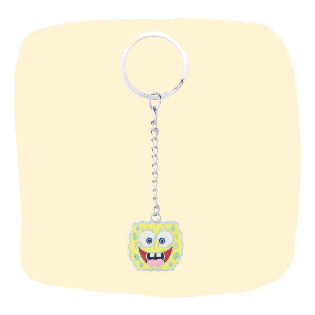Yellow Spongebob keychain with cute fancy charm from Arendelle Kids, perfect for bags or keys. Fun cartoon accessory for kids and fans.