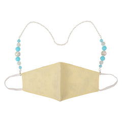 Front view of kids beaded mask holder chain with blue and clear beads clipped to a yellow mask, offering a secure and trendy solution.