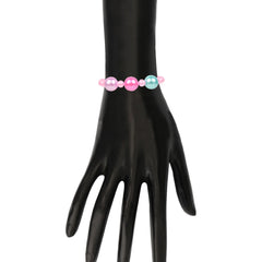 Stylish pink beaded bracelet from the Beaded Jewellery Set - Pink Girls shown on a mannequin hand. Colorful and playful design.