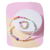 Beaded Necklace Bracelet Set - Trendy Jewelry | Colorful, Adjustable. Features vibrant pastel beads and charms in a fun boho-chic design.