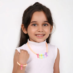 Girl wearing Custom Kids Necklace Bracelet Set with name letters, perfect personalized jewelry gift for birthdays or special occasions.