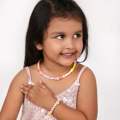 Girl wearing Arendelle Jewelry Set - Name Necklace Bracelet with colorful beads and custom name, ideal for personalized kids' accessories.