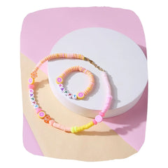 Arendelle Jewelry Set - Name Necklace Bracelet in pastel colors with fruit and heart beads, perfect for girls aged 7 to 12. Customizable design for kids.