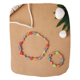 Colorful floral beaded necklace and bracelet set for teens, featuring vibrant rose-shaped beads in a boho style.