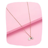 Cartoon Cat Necklace for Kids with white cat pendant on gold chain, styled on pink background. Fun animal charm for everyday wear.