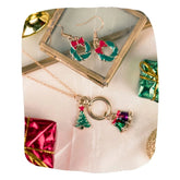 Christmas Jewelry Set - Festive Jewelry for Girls featuring a gold-tone necklace with tree and bell charms and matching wreath earrings, ideal for gifting.