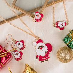 Christmas Set - Jewelry for Girls featuring Santa Claus pendant, earrings, ring, and bracelet on festive background. Ideal for holiday gifts.